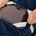 the Sensory Basics Weighted Lap Pad holding a Tablet