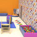 Peel-and-stick wallpaper with a vibrant design applied to the walls of a sensory room