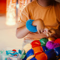 Child playing with the sensory tool kit