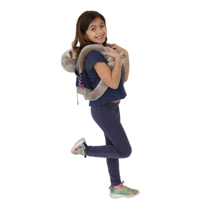 Girl holding the animal teddy bear with the Mini Me Dressing Vest