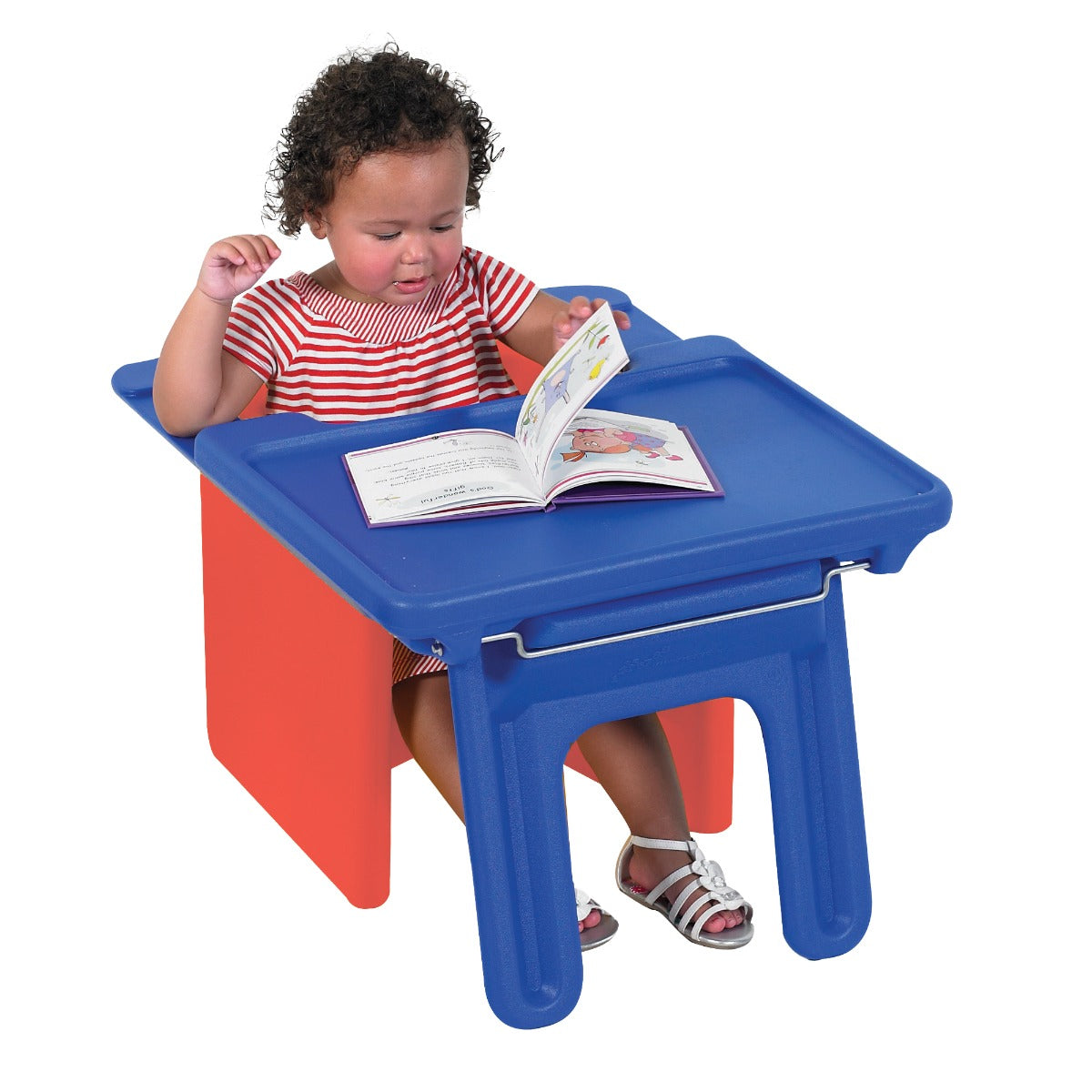 Boy sitting on a red Educube Chair