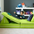 Boy playing with a car on the green Zipline PlayScape Convertible Kids Couch