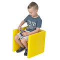 Boy sitting on a yellow Educube Chair