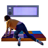 Girl playing with the SensaSoft™ Musical Lightup Hopscotch