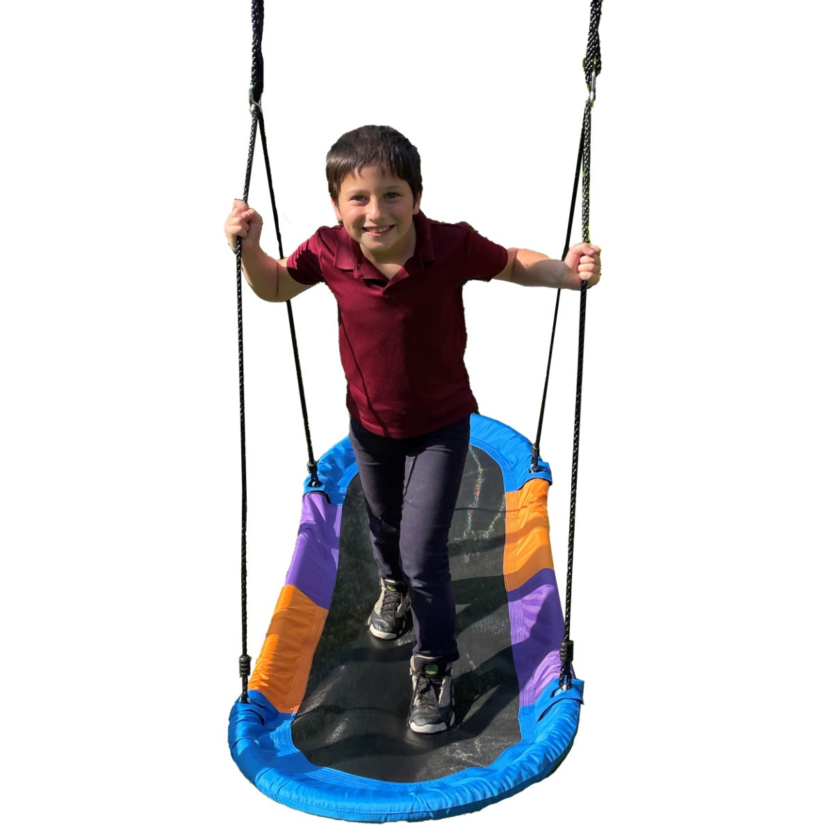 boy standing on the Magic Carpet Swing