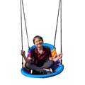 boy sitting on the Magic Carpet Swing