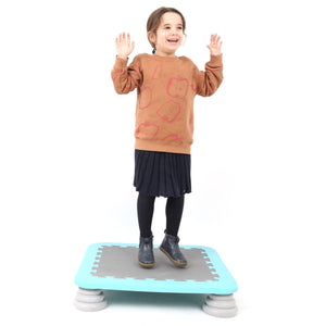 Girl using the Bounce Board