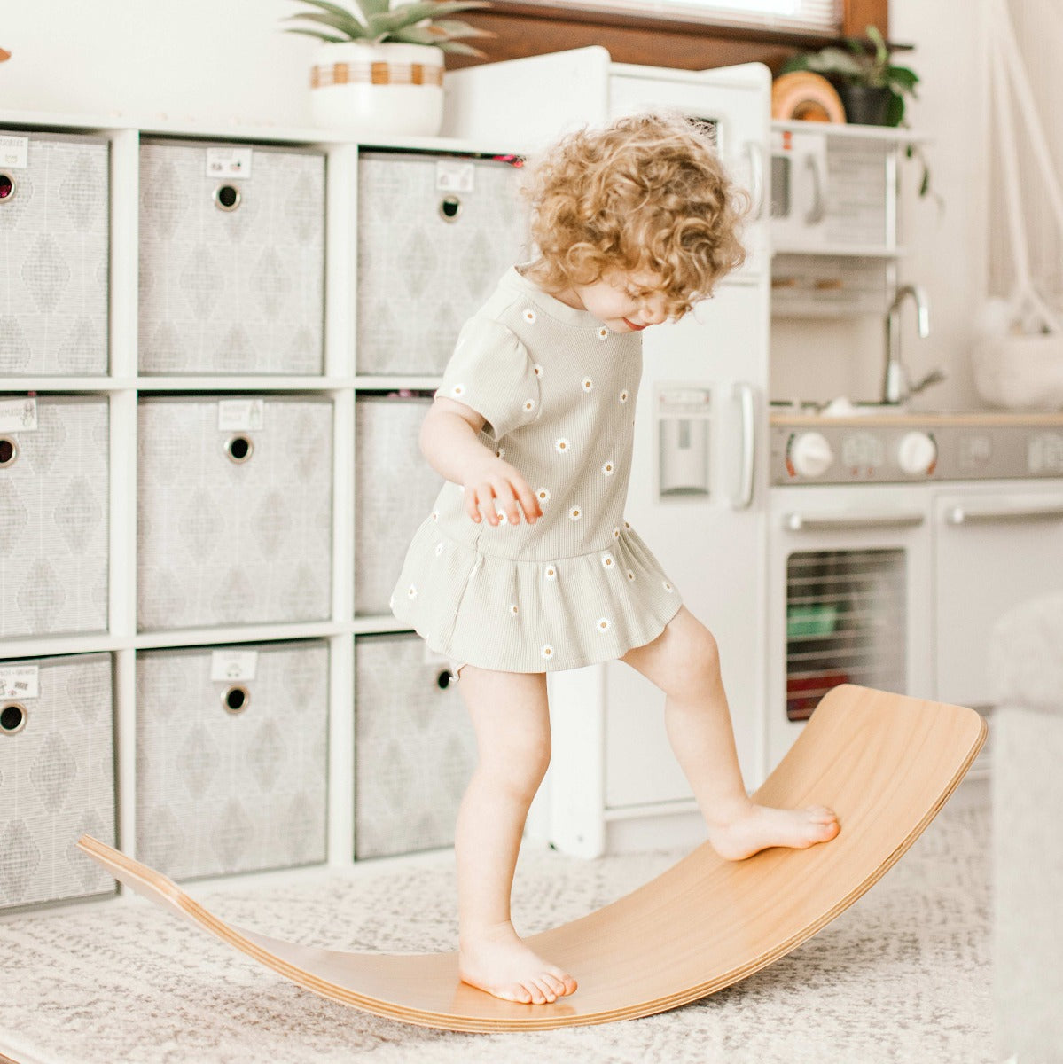 Girl on the Wooden Balance Board