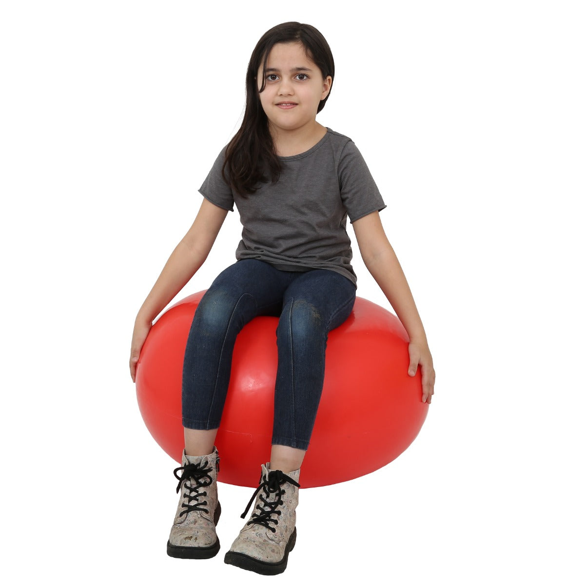Girl sitting on the CanDo Donut Ball