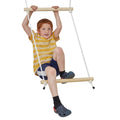 child climbing while hanging from double trapeze bar swing