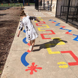 child playing on the Outdoor Paint-A-Path
