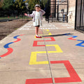 child playing on Outdoor Paint-A-Path