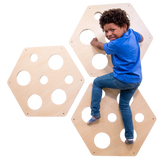 Child climbing on the Honeycomb Climbing Panels - Set of 3
