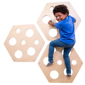 Child climbing on the Honeycomb Climbing Panels - Set of 3