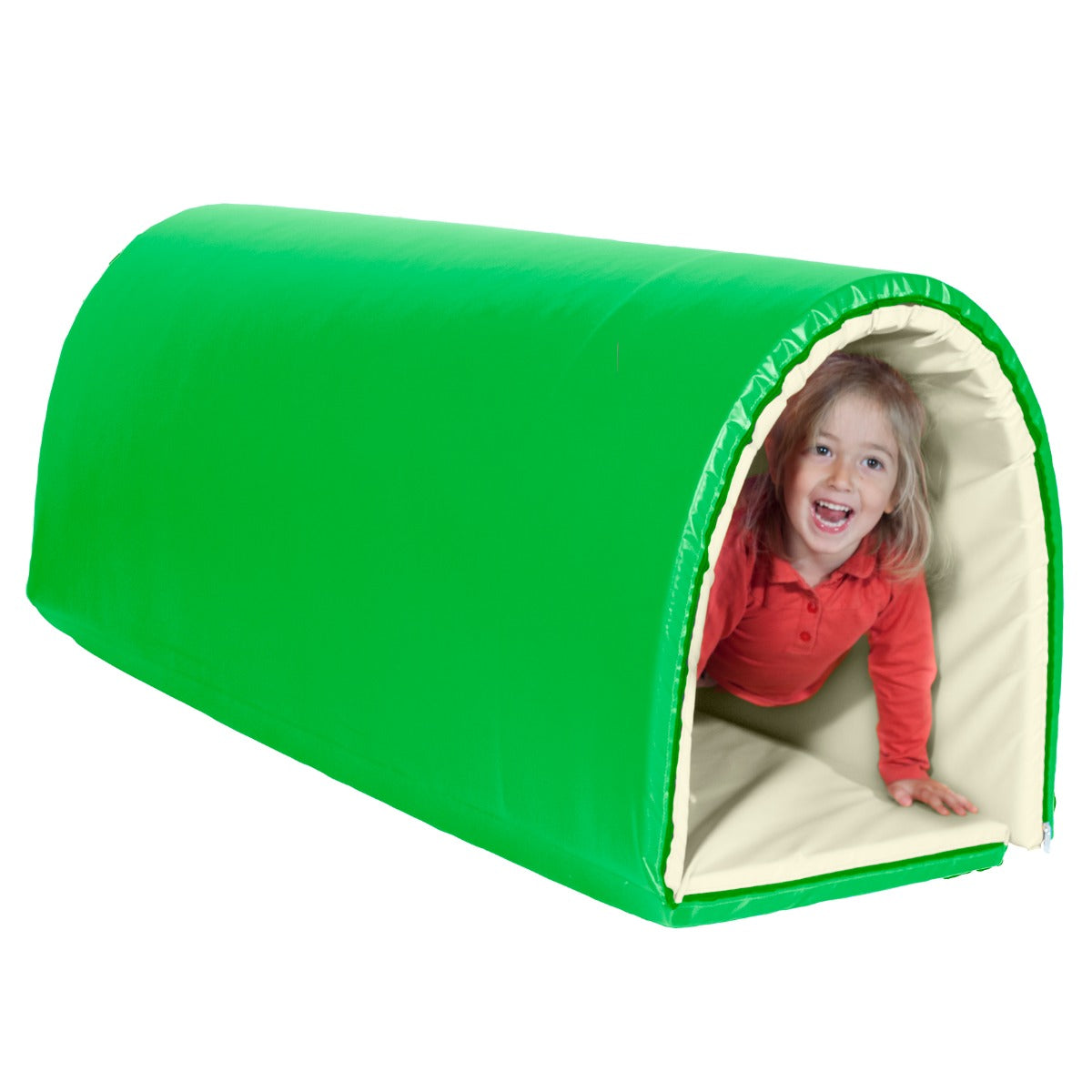 girl playing inside a green Sensasoft Tunnel Mat rolled into a semi‑circular tunnel with white interior