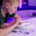 Boy using the Wireless Sensory Room Switch Cards