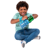 Boy smiling while playing with the Busy Fingers Fidget Muff