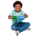 Boy smiling while playing with the Busy Fingers Fidget Muff