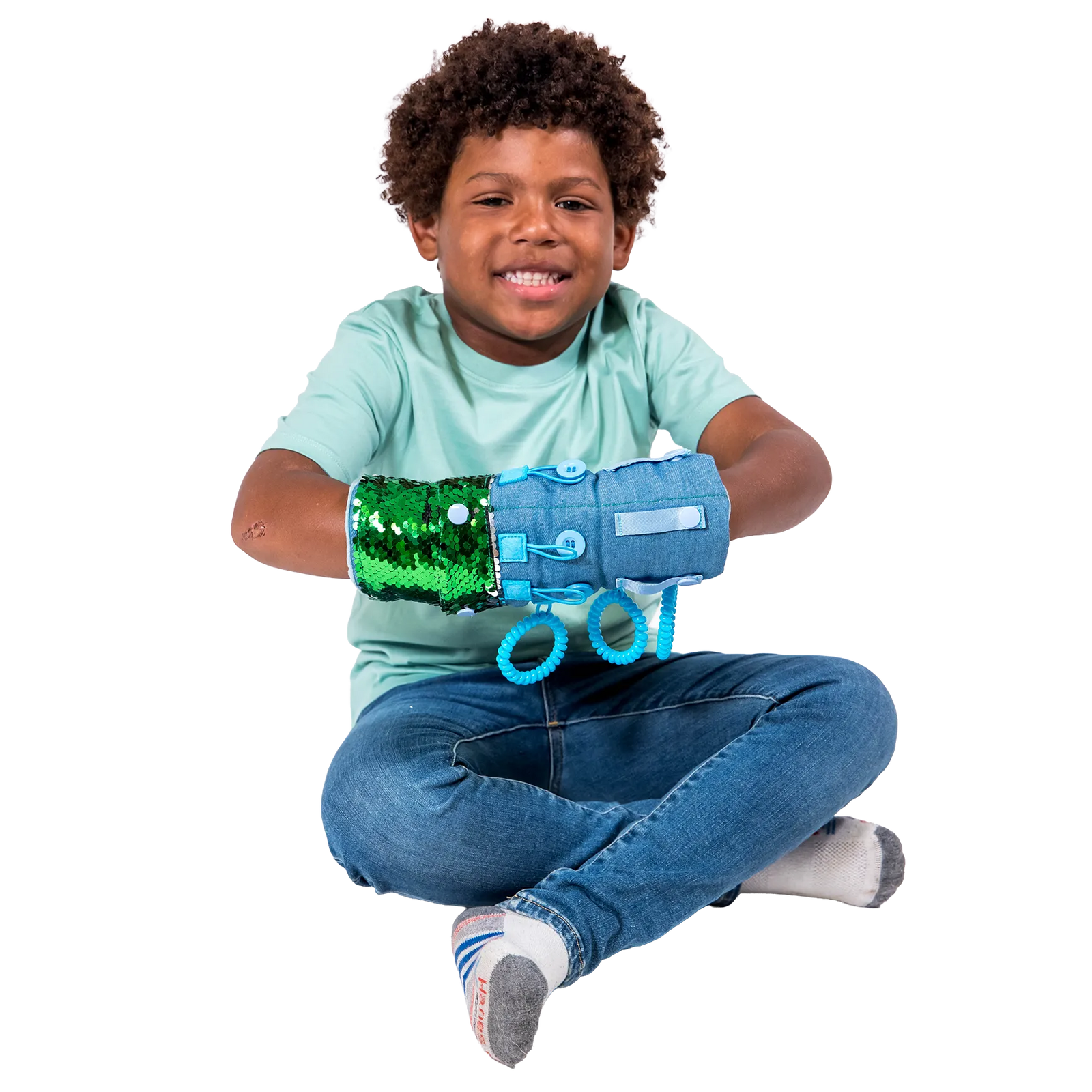Boy smiling while playing with the Busy Fingers Fidget Muff