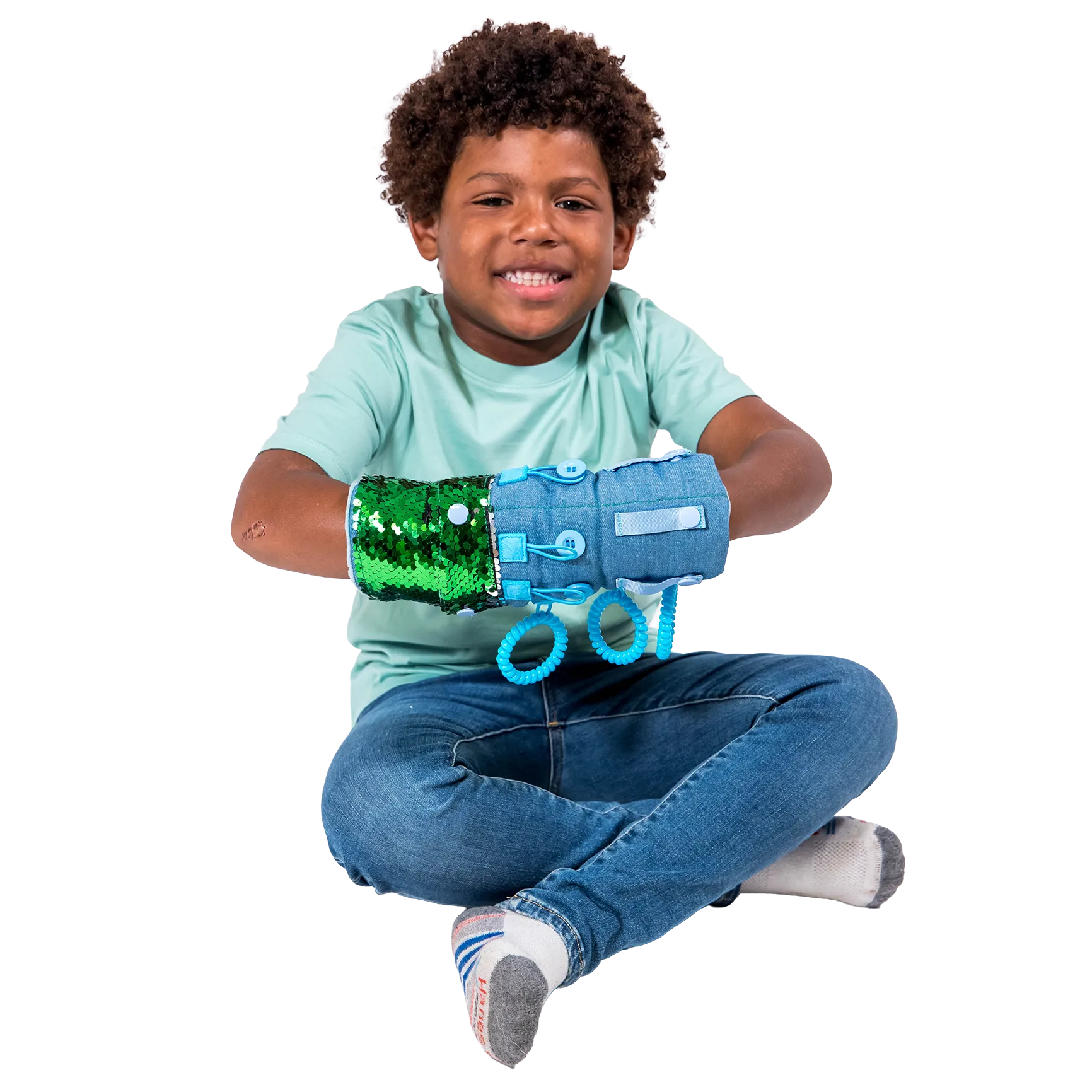 Boy smiling while playing with the Busy Fingers Fidget Muff