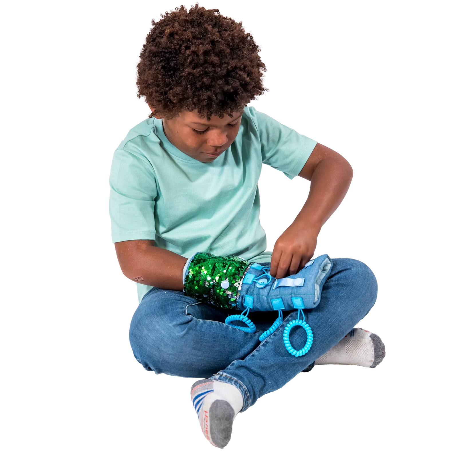 Boy playing with the Busy Fingers Fidget Muff