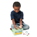 Boy playing with the weighted sand kit
