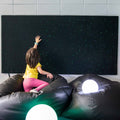 Girl touching the Fiber Optic Wall Carpet with Lightsource