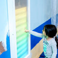 Girl using the Sound Activated light up Wall Panel