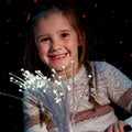 Girl playing with the Fiber Optic LED Strands With Lightsource