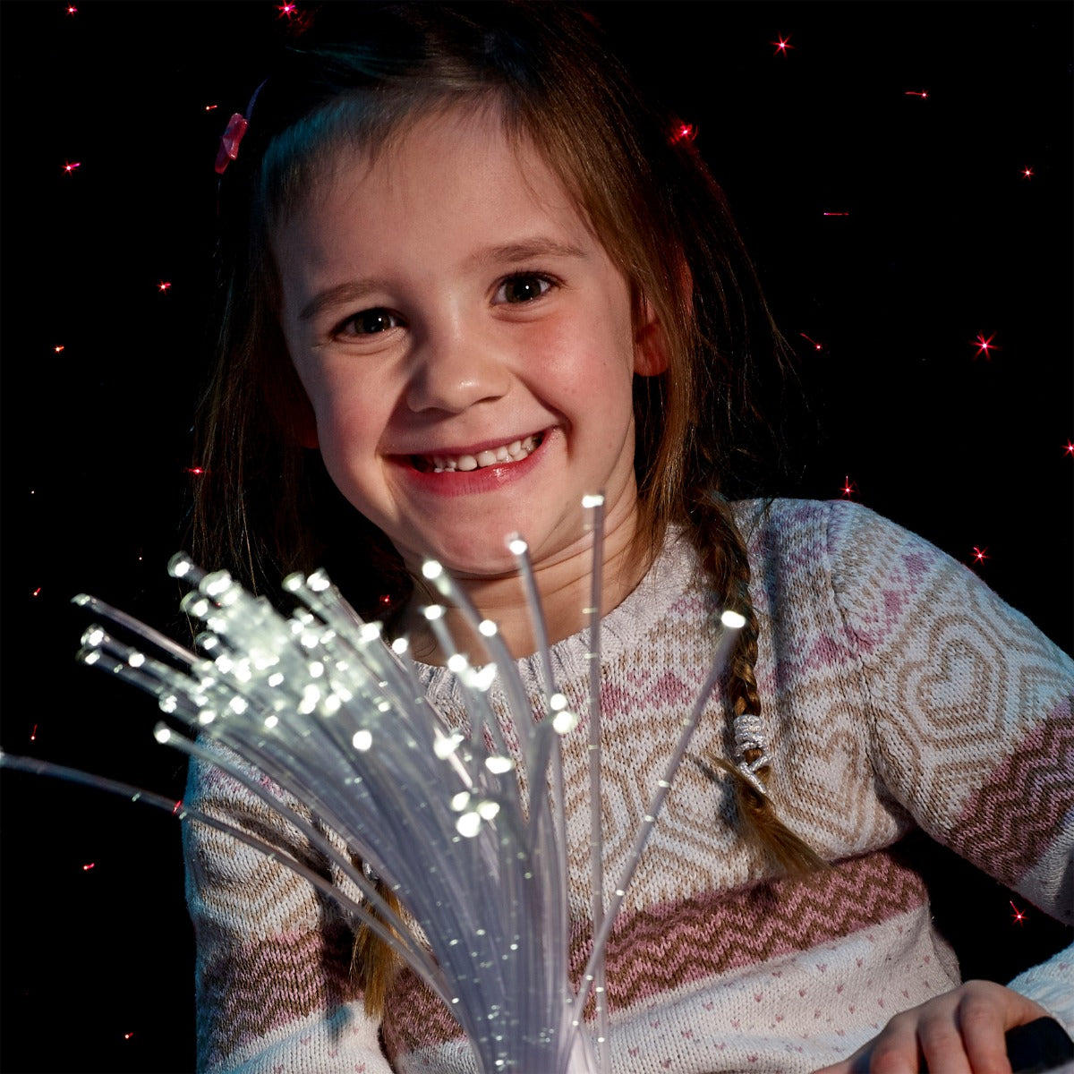 Girl playing with the Fiber Optic LED Strands With Lightsource