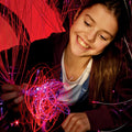 Girl playing with the Fiber Optic LED Strands With Lightsource