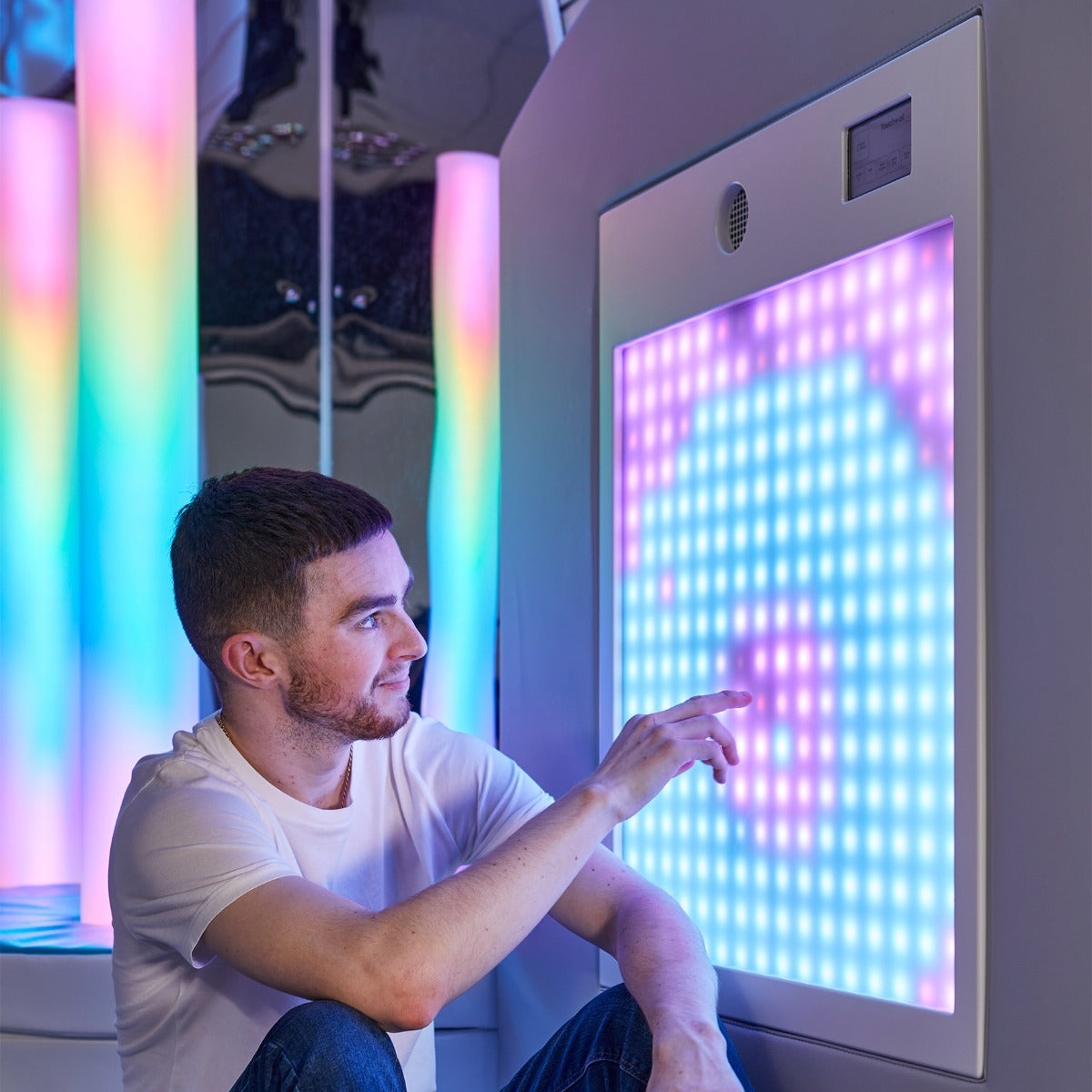 Boy using the Music Touch Wall