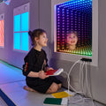 child using the Fiber Optic Infinity Light Panel