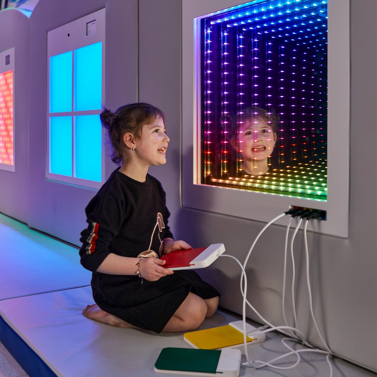 child using the Fiber Optic Infinity Light Panel