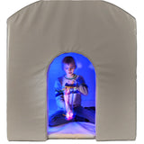 Child playing with a sensory toy inside the SensaSoft Hideaway