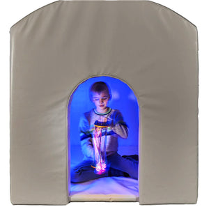 Child playing with a sensory toy inside the SensaSoft Hideaway