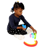 Girl playing with the Rainbow Stacker