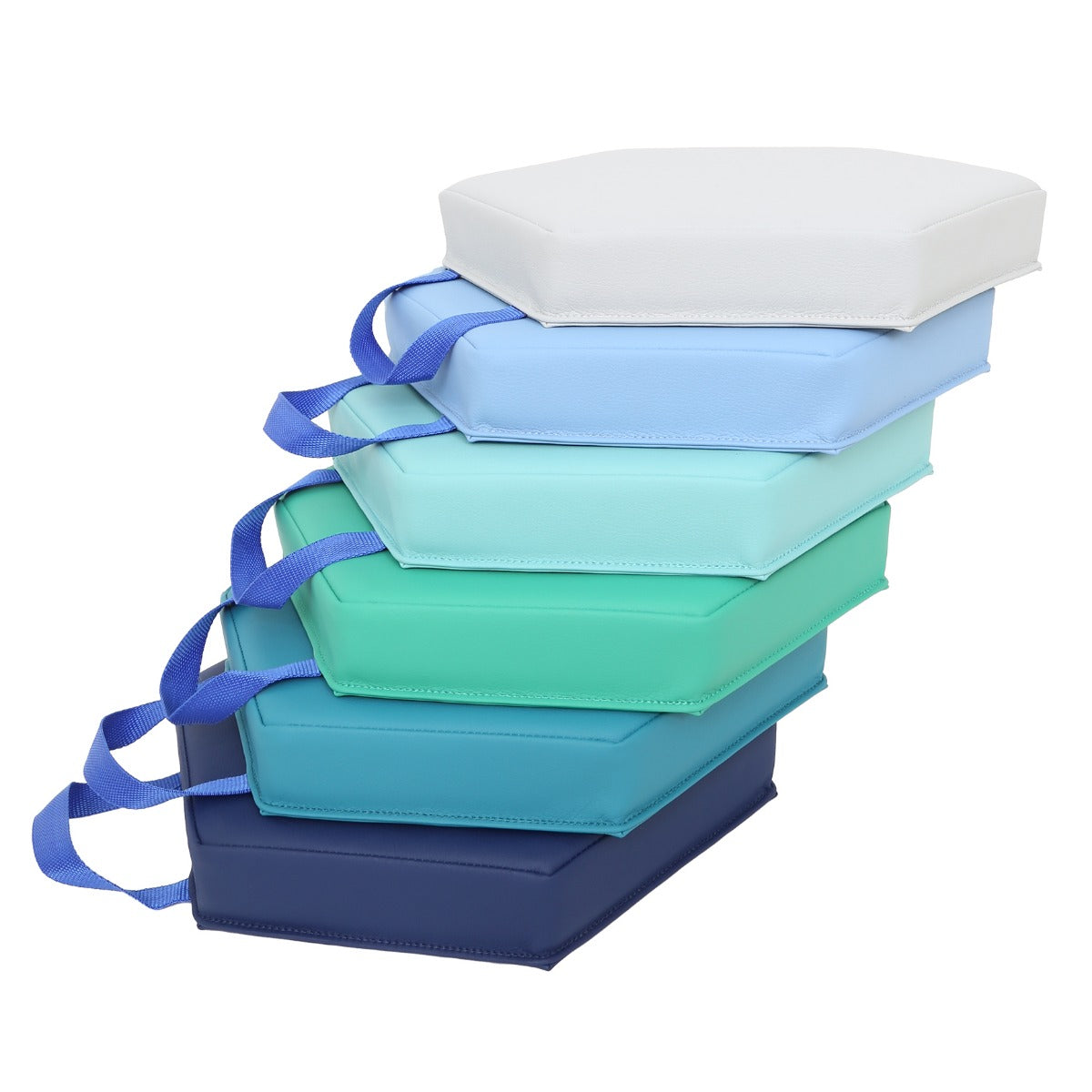 A pile of Honeycomb Cushions in Colors: Navy, turquoise, green, teal, sky blue, grey and royal blue handles
