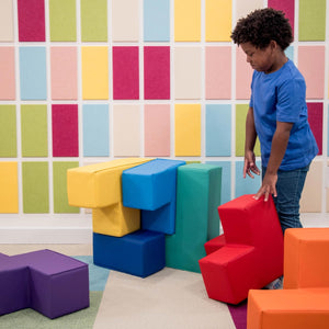Boy playing with the SensaSoft Puzzle Cubes