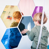 Boy touching the Honeycomb Mirrors