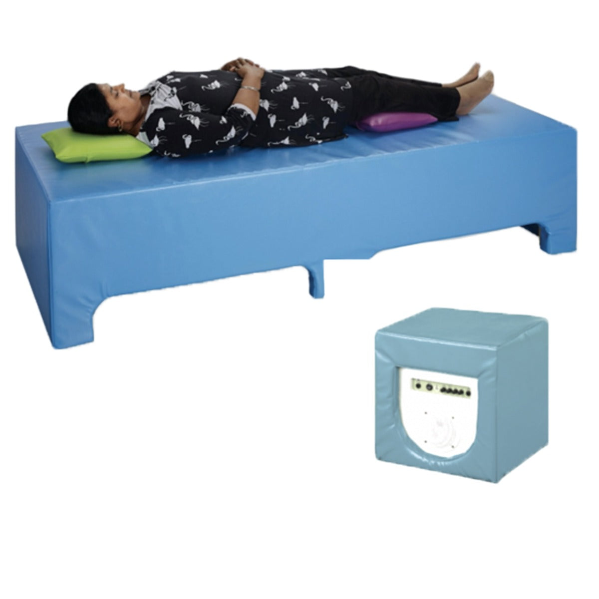 Woman laying on the blue SensaSoft Vibroacoustic Bench