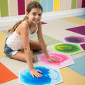 Child touching the textured gel tile