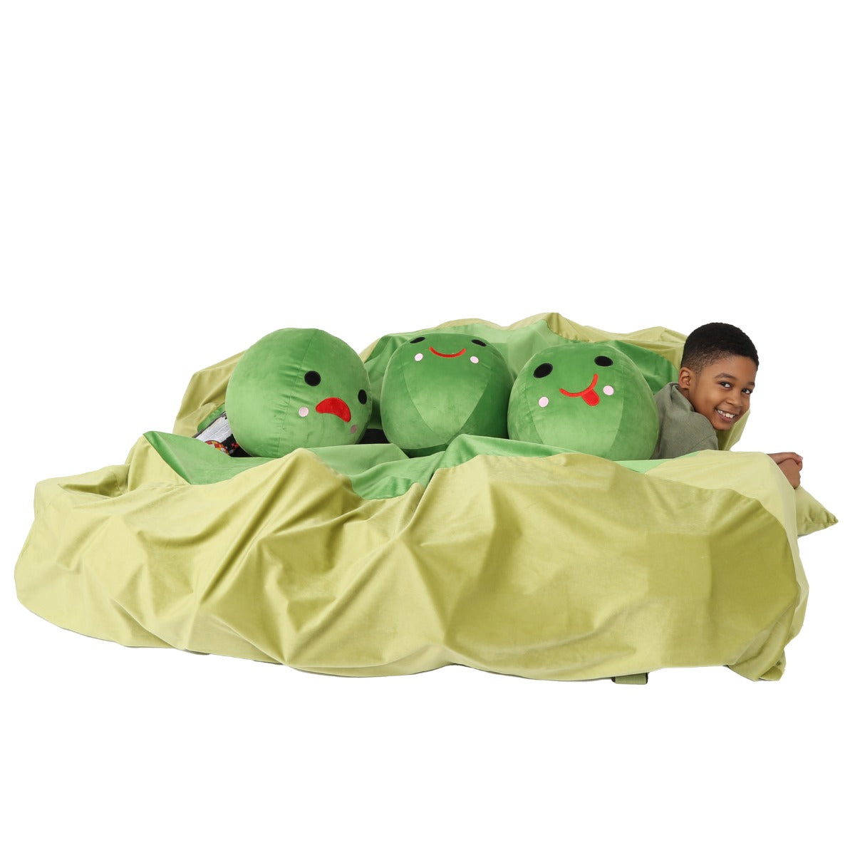 Boy smiling while playing with the Peace In A Pod