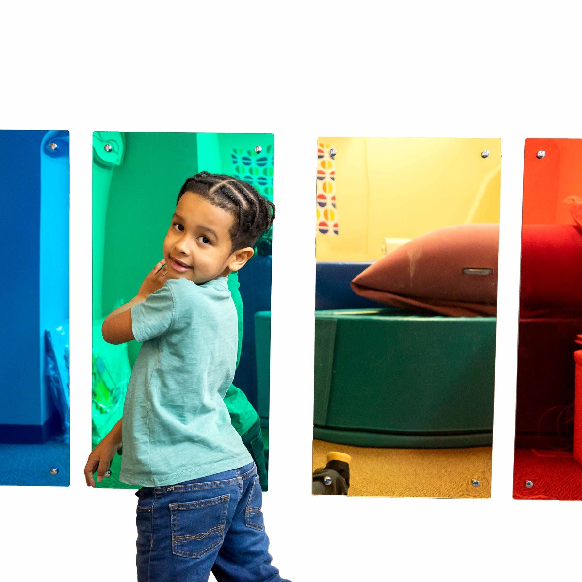 boy smiling while touching the green Tinted Rainbow Mirror