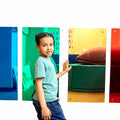 boy smiling while touching the yellow Tinted Rainbow Mirror