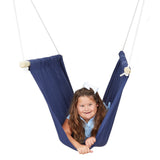 girl lying on front in the blue Soft Taco Swing