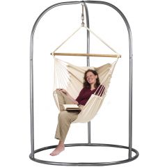Woman sitting comfortably and reading on the Swing Chair