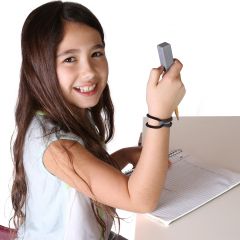 Girl holding a Pencil with a gray pencil Topper