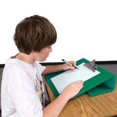 Boy using the Ergo-Rite Slant Board for Writing