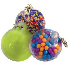 Fidget Key Chain Balls - Set of 3. Colors: Balls: Blue, orange and purple. Pellets: Yellow, red and blue. Sand: Neon yellow